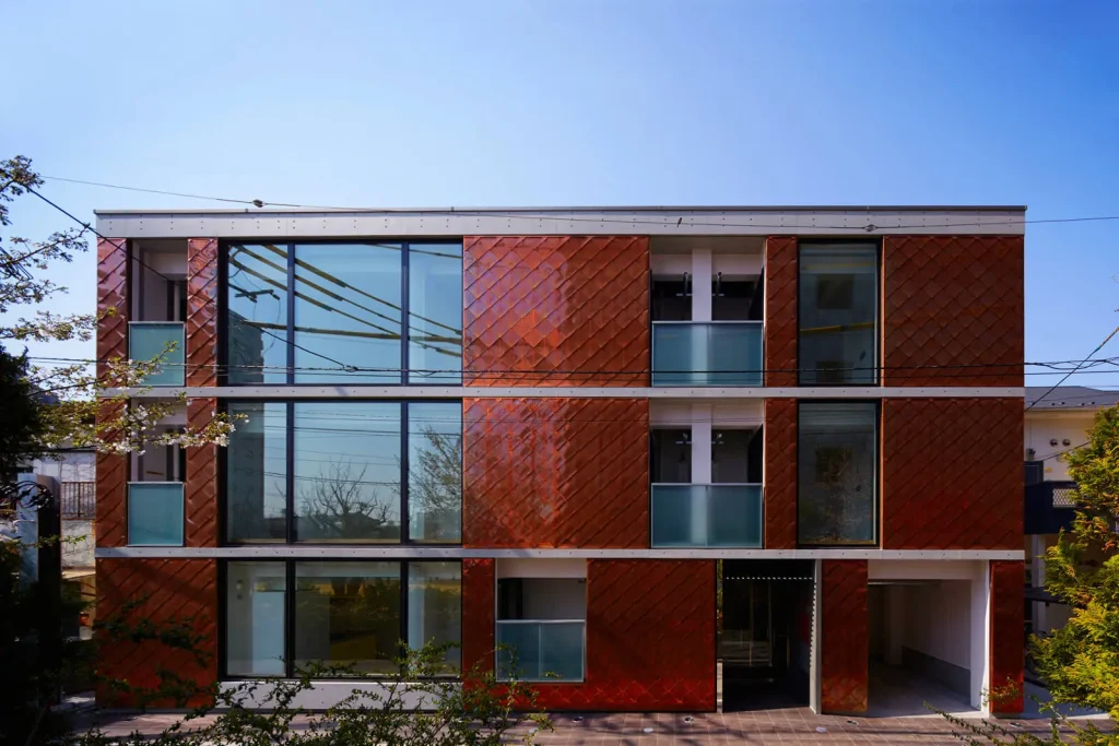 鉄骨造3階建てデザイナーズ賃貸マンション銅板菱葺きファサードグッドデザイン賞受賞